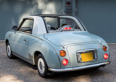 1991 Nissan Figaro vue trois quarts arrière gauche.