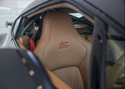 2011 Aston Martin V12 Zagato le Z de Zagato orne les appuie-têtes.